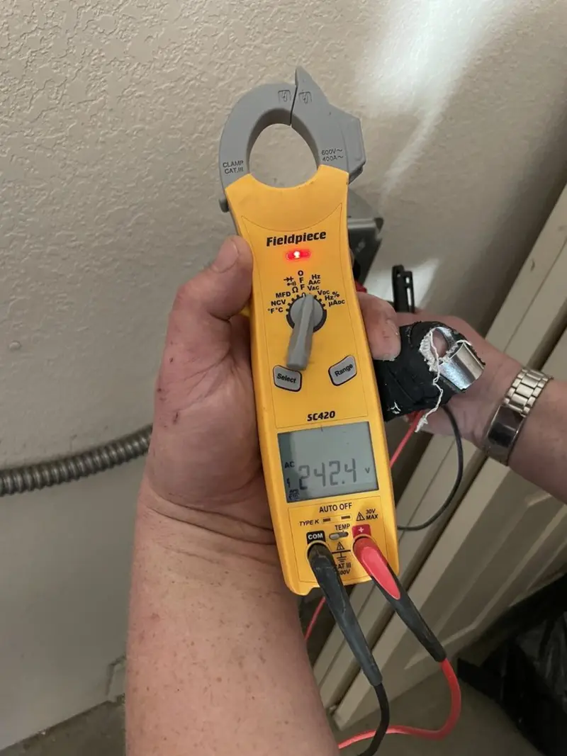Voltage testing with clamp meter during Generator Installation in Kaukauna